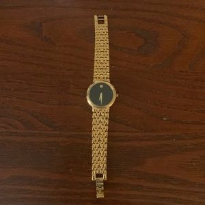 Movado watch - gold with black face